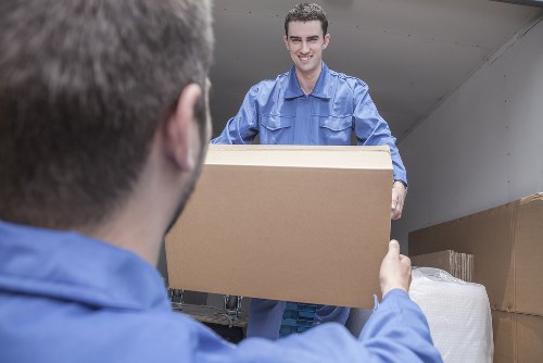 Man with van moving boxes and furniture in Tower Hill