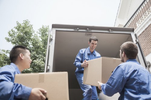 Office equipment and furniture prepared for a Tower Hill business move