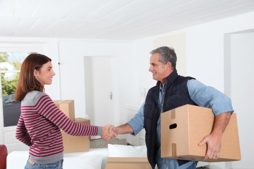 Loading boxes and furniture into a local moving van in Tower Hill