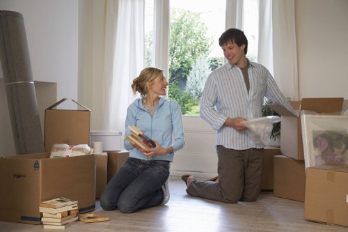 Professional movers navigating a central London street in Tower Hill